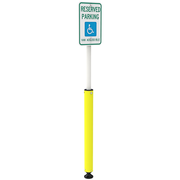 A yellow Impact Recovery Systems Sta-Rite bollard with a "Handicapped Reserved Parking / Van Accessible" sign on it.