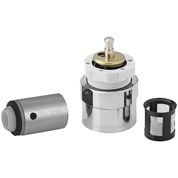 A silver and black Chicago Faucets MVP metering cartridge and actuator.