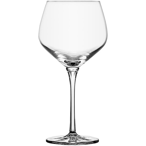 A close-up of a clear Schott Zwiesel Burgundy wine glass with a stem.