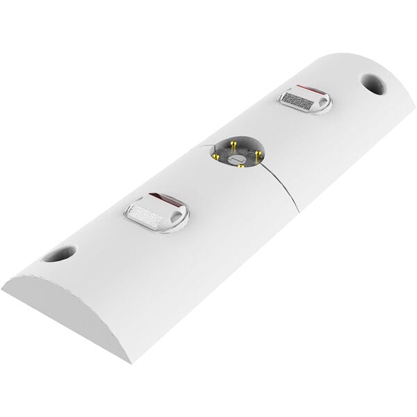 A white rectangular object with red and white reflectors on the sides and holes.