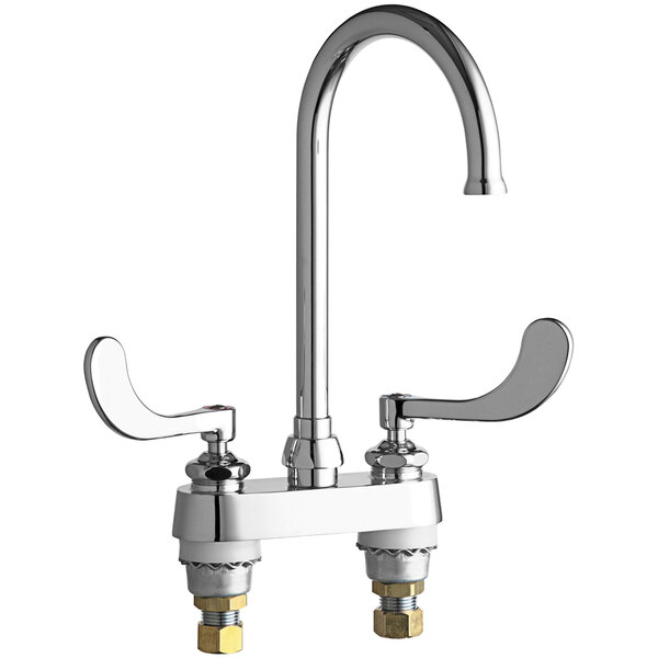 A chrome Chicago Faucets deck-mounted faucet with two levers.