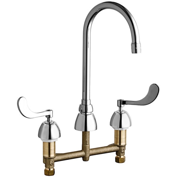 A chrome Chicago Faucets deck-mounted faucet with two lever handles.