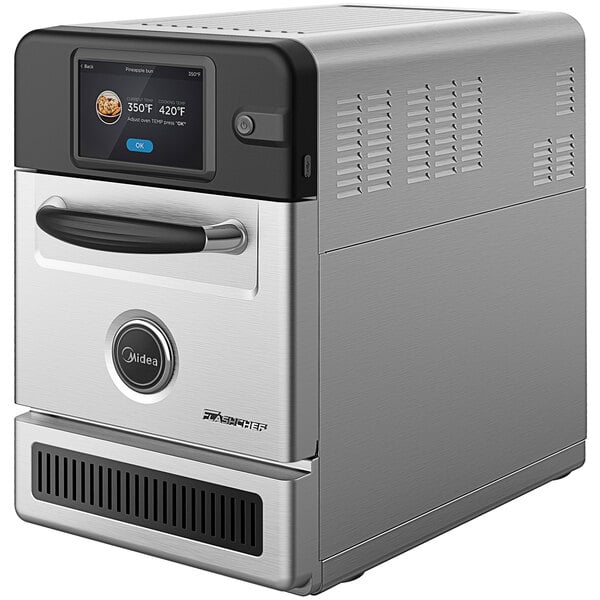 A silver and black Midea G1 FlashChef high-speed oven on a counter.