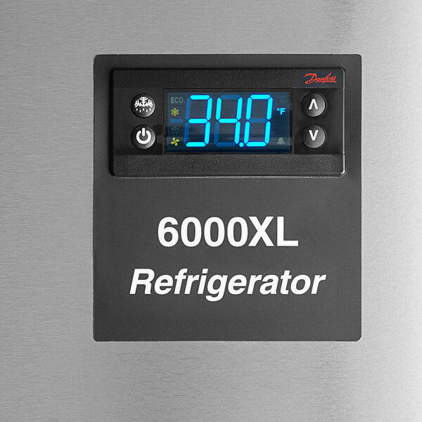 A Delfield reach-in refrigerator with a black rectangular digital temperature display.