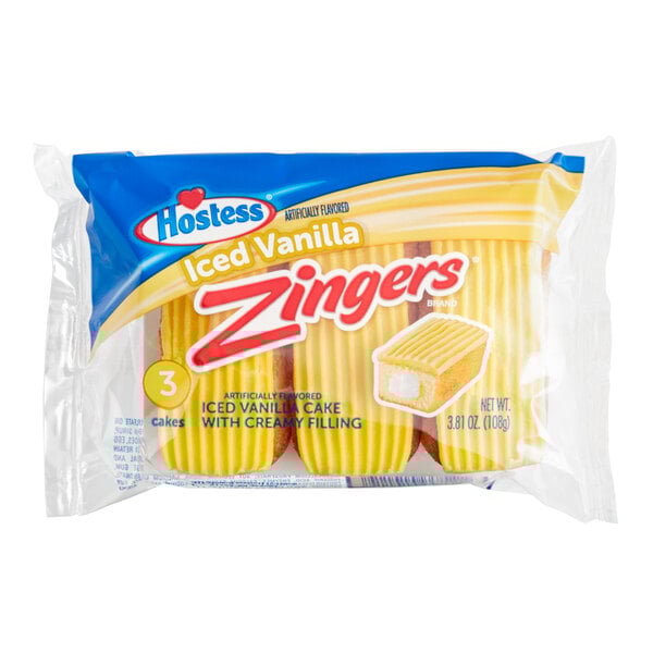 A close up of a 36 case package of Hostess Zingers Single Serve Iced Vanilla Cake.