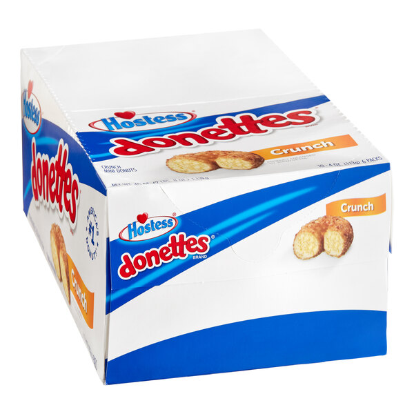 A white and blue box of Hostess Donettes mini donuts.