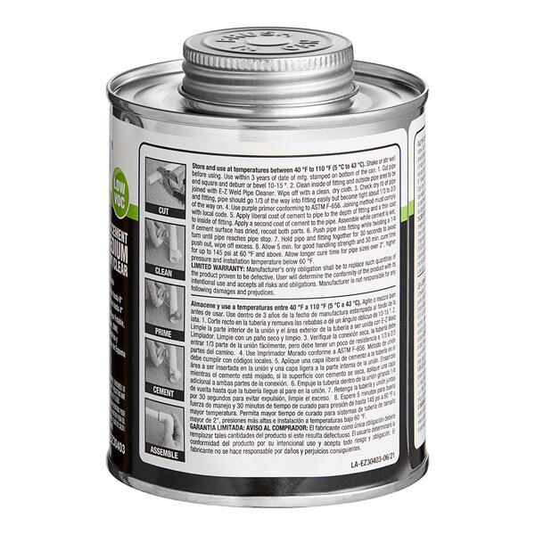 A close up of a 16 oz. clear E-Z Weld PVC Cement can with text on it.