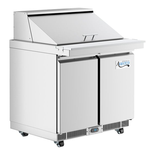 An Avantco stainless steel 36" sandwich prep table with two doors.