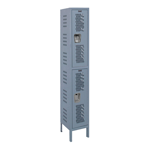 A tall gray Hallowell metal wardrobe locker with two compartments with holes in the doors.