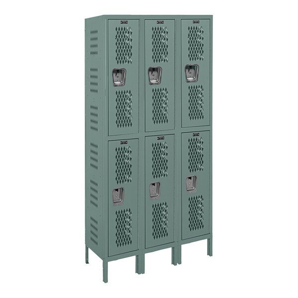 A gray Hallowell triple 2-tier wardrobe locker with three doors.