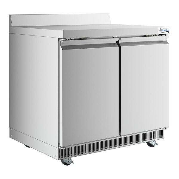 An Avantco stainless steel worktop freezer with two doors and a backsplash.