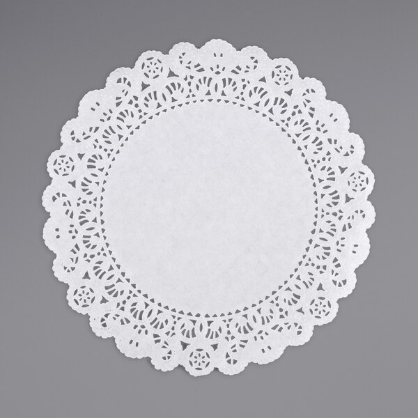 a white doily with a heart pattern
