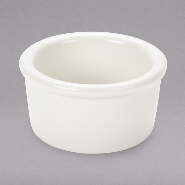 A Tuxton eggshell white china ramekin.