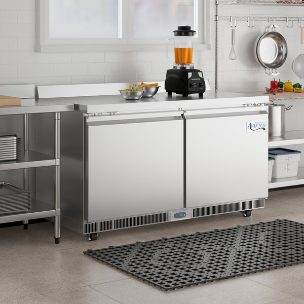 An Avantco stainless steel worktop refrigerator with a large counter top.