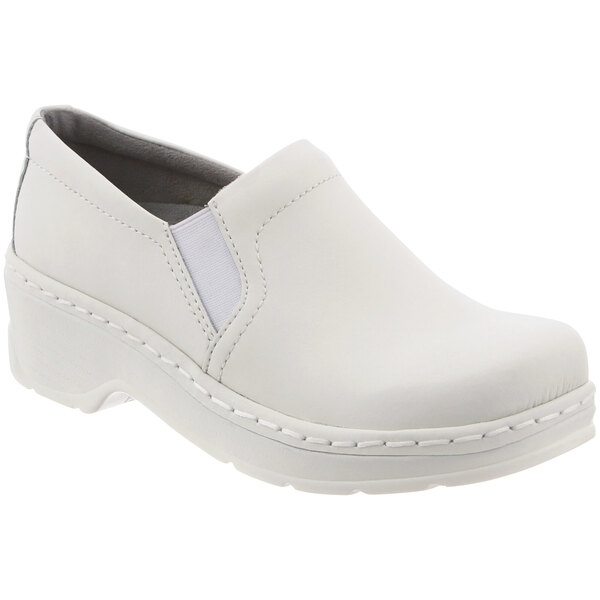 A white leather Klogs women's clog with a white sole.