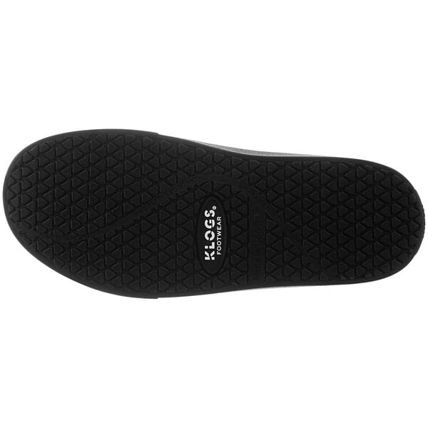 The black sole of a Klogs Tiburon women's clog with a logo on it.