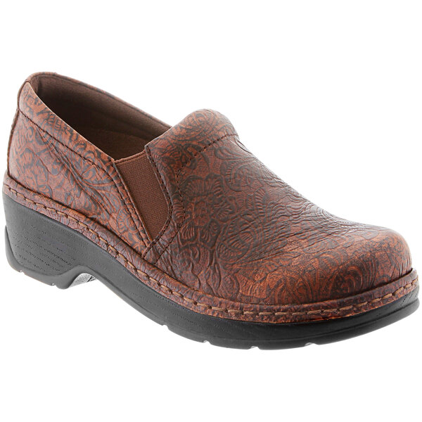 A brown leather Klogs Naples women's clog with a black sole.