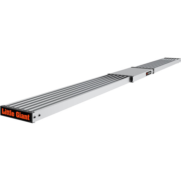 A long metal Little Giant aluminum plank with orange and black stripes.