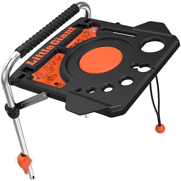 A black and orange Little Giant AirDeck workstation on a table.