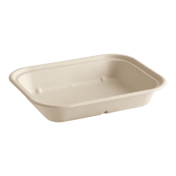 A World Centric white compostable fiber container with a lid.