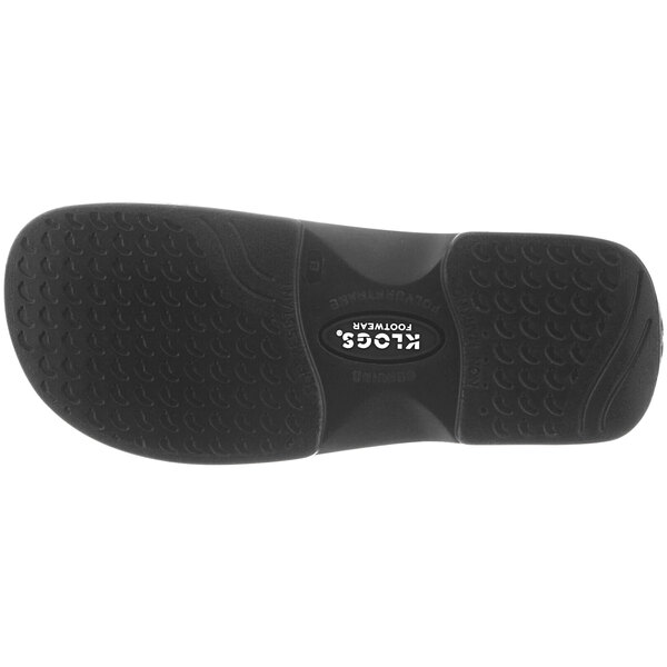 A close-up of a black Klogs Zest men's clog with a black sole.