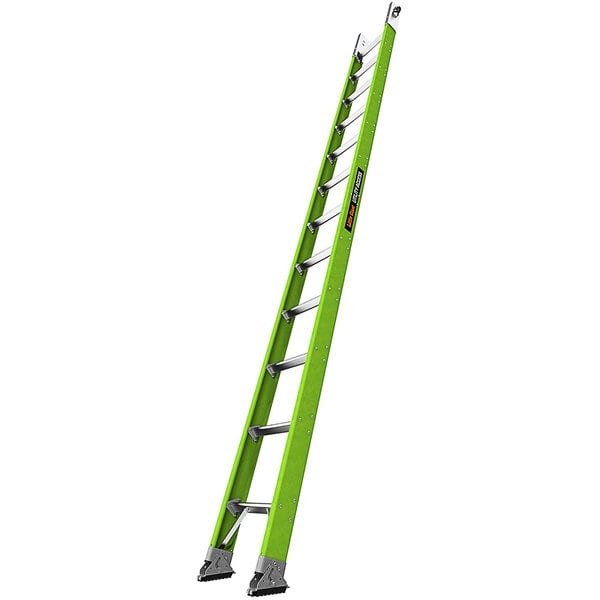 The base section of a green Little Giant fiberglass ladder with silver swivel feet.