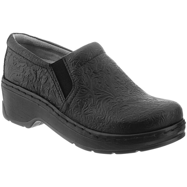 A black Klogs Naples women's clog with a floral pattern.