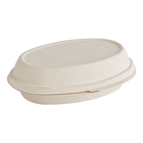 A World Centric compostable fiber burrito bowl clamshell with a lid.