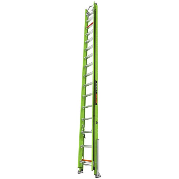 A green Little Giant fiberglass extension ladder with red accents and white text.