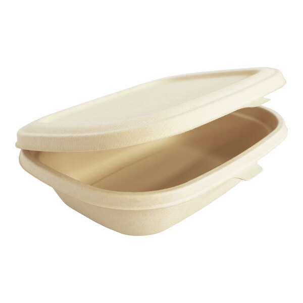 A close-up of a World Centric compostable fiber container with a lid on a white background.