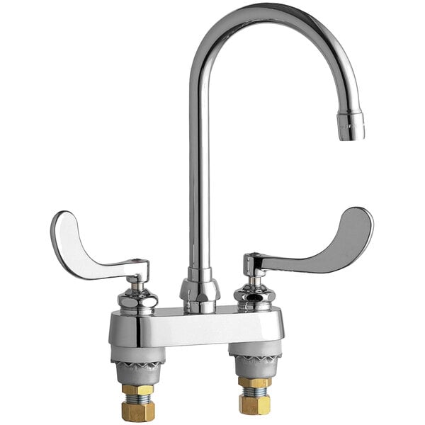 A chrome Chicago Faucets deck-mounted faucet with two handles.