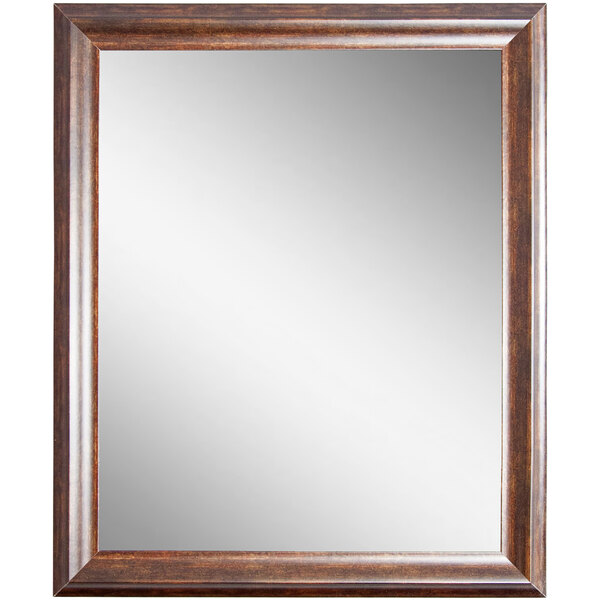 A BrandtWorks copper brown mirror with a wooden frame.