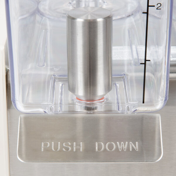 A Crathco refrigerated beverage dispenser with metal cylinders in plastic containers.