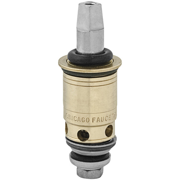 A brass cylinder with a black top and gold accents.
