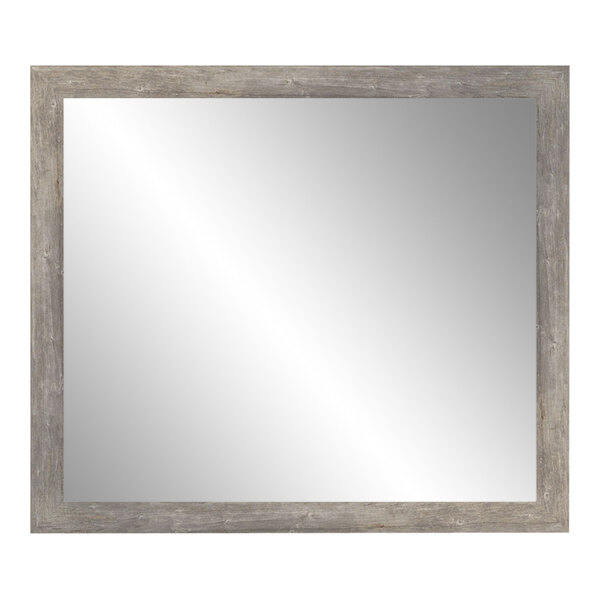 A BrandtWorks mirror with a barnwood gray finish wooden frame.