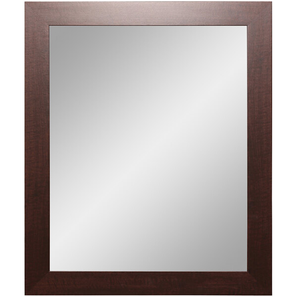 A BrandtWorks rectangular mirror with a dark walnut frame.