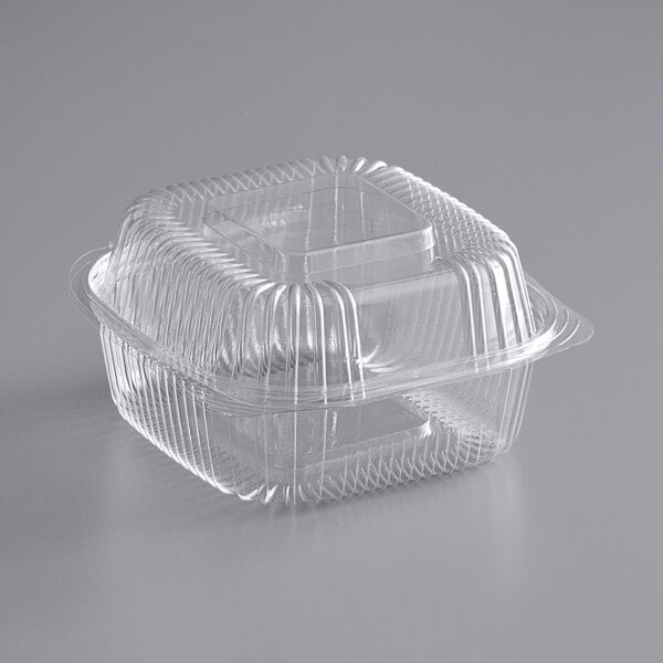 A clear plastic Stalk Market container with a square lid.