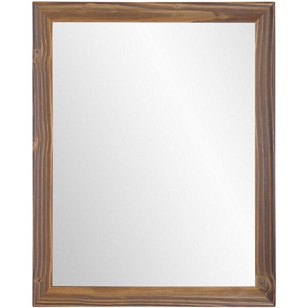 A BrandtWorks natural wood tone mirror with a wooden frame.