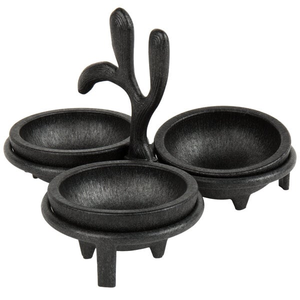 A black polyethylene bowl holder holding three black molcajete bowls.