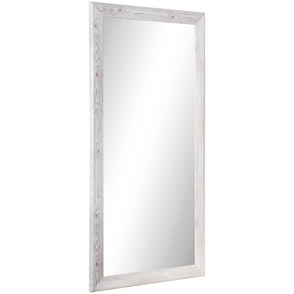 A white rectangular BrandtWorks mirror with a wooden frame.