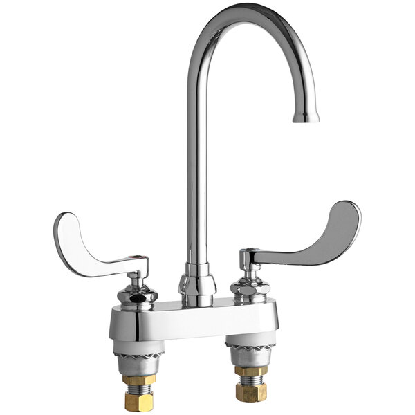 A chrome Chicago Faucets deck-mounted faucet with levers and a gooseneck spout.