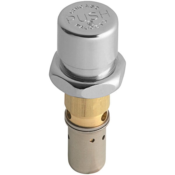 A Chicago Faucets NAIAD metering cartridge with a chrome and gold push button.