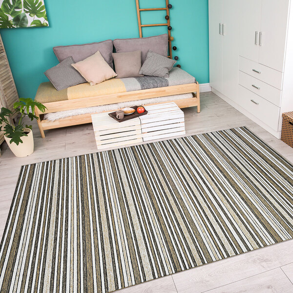 A white room with a Couristan Cape Brockton light brown and ivory striped rug.
