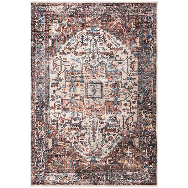 An Abani Lola terracotta area rug with a blue and brown medallion pattern.