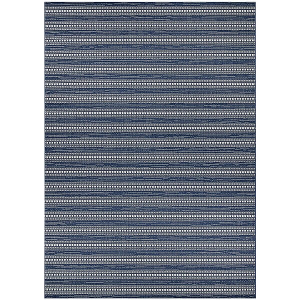 A close-up of a blue and white striped Couristan Afuera Beachcomber runner rug with a small design.