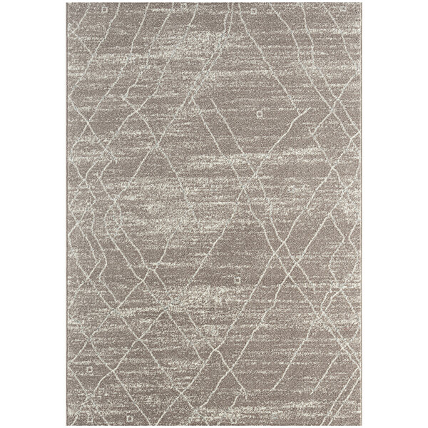 An Abani Casa Collection beige area rug with a Southwestern tribal pattern.