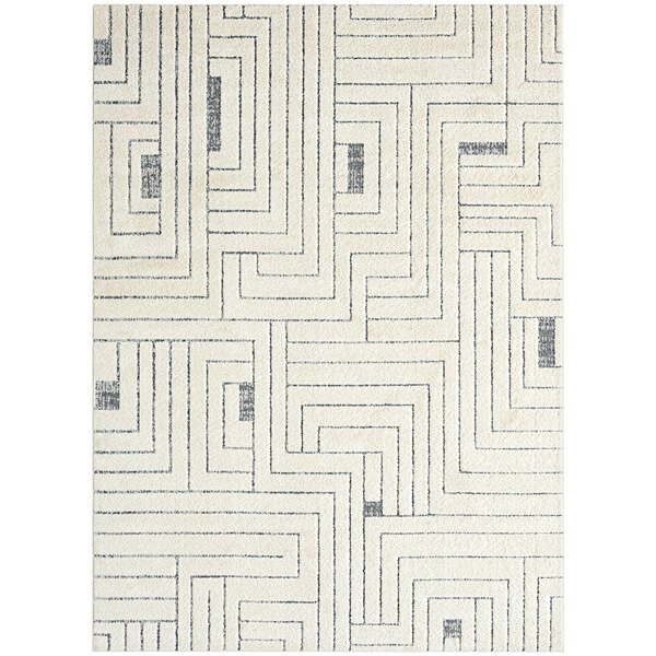 A white rectangular area rug with a gray labyrinth pattern.