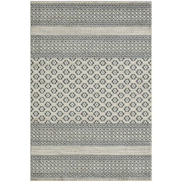 A cream and grey lined area rug with a geometric pattern.