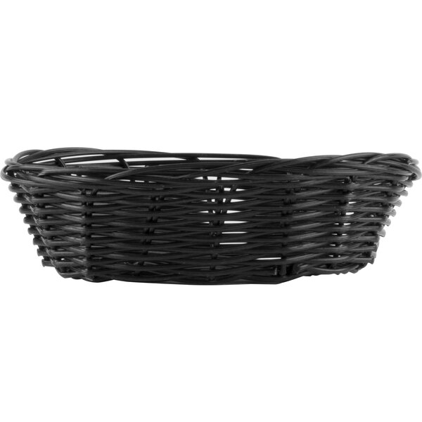 A close-up of a Tablecraft black oval rattan basket with handles.