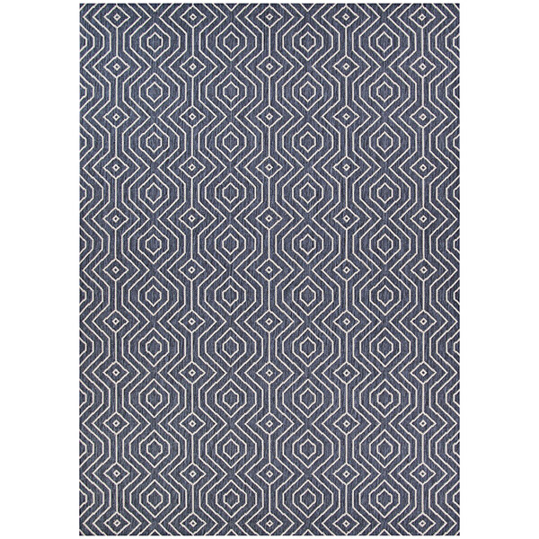 A Couristan Afuera Actinide area rug with a geometric pattern in blue and grey.